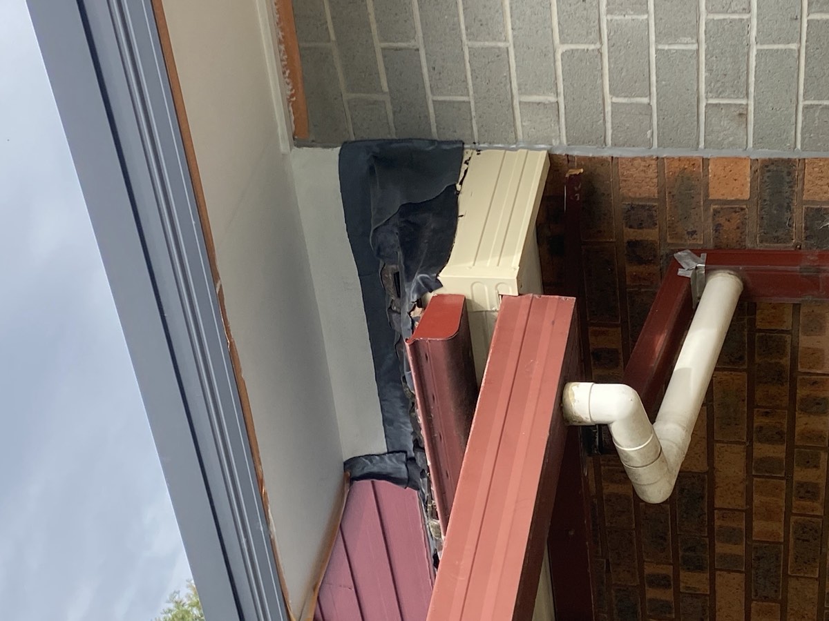 Non compliant flashing, recorded on a handover inspection in Riverstone