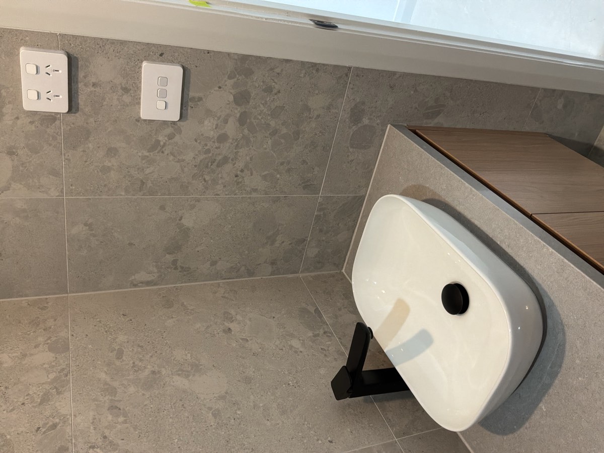 Light or switch too close to a shower, recorded on a handover inspection in Riverstone